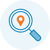 Icon of magnifying glass with location icon in the center